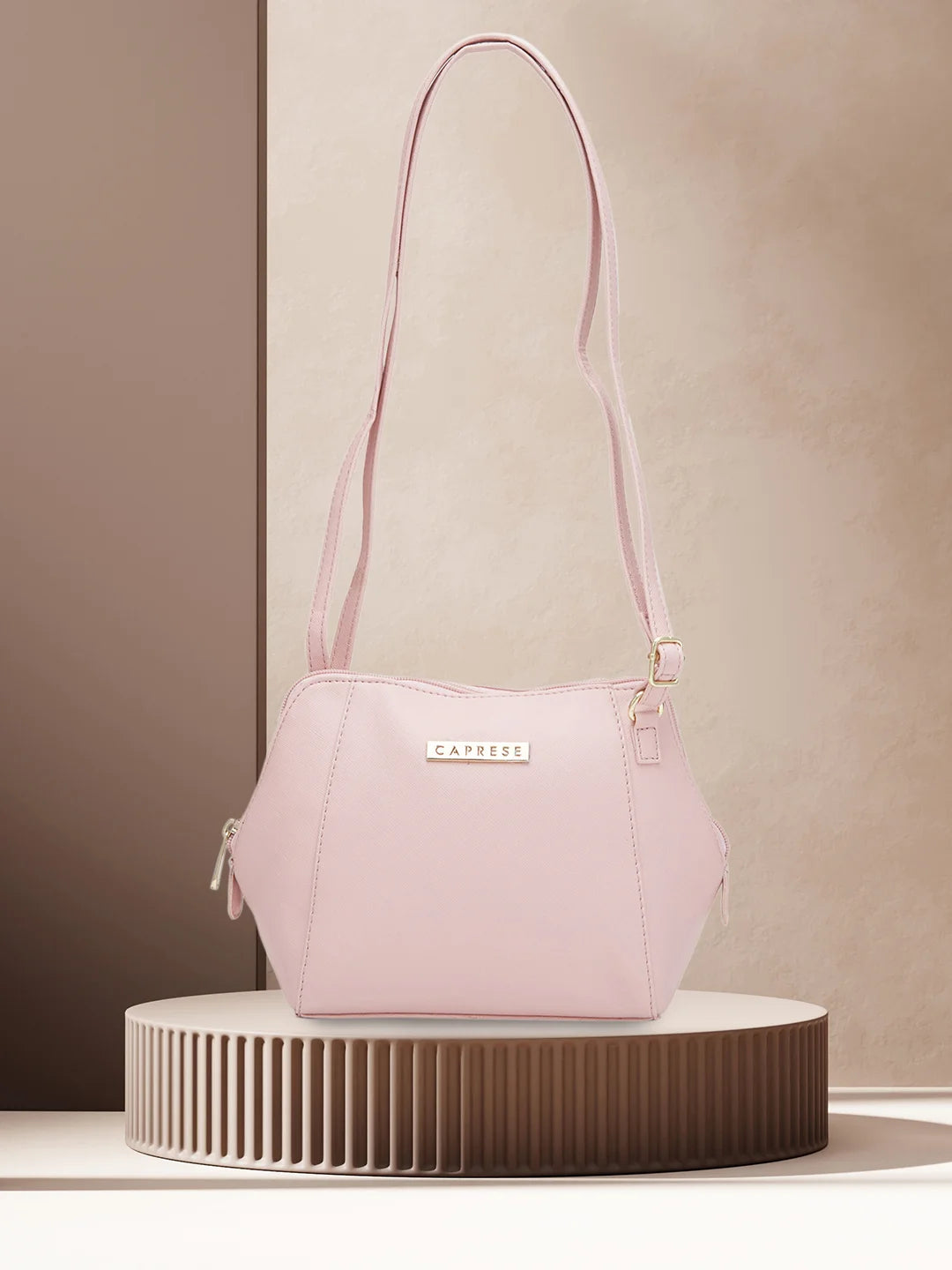 Caprese Holden Small Sling Solid Faux Leather For Women Powder Pink