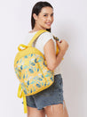 Caprese Xenia Backpack Medium Yellow Printed