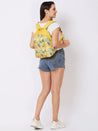 Caprese Xenia Backpack Medium Yellow Printed